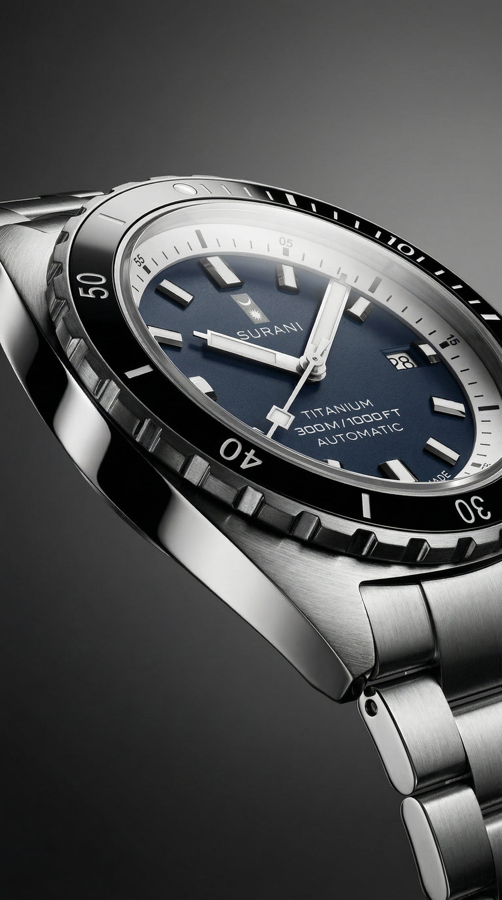 Silver watch with blue dial on a dark background